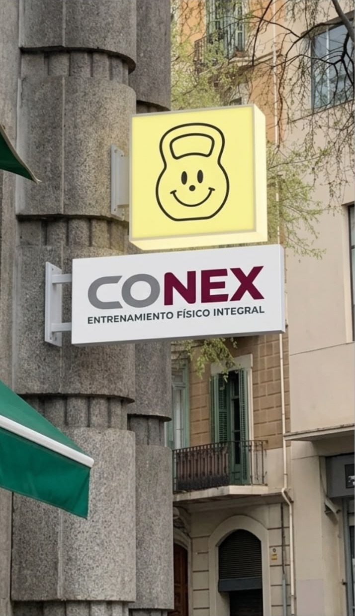 Cartel de Conex en la fachada, con la pesita sonriente y el nombre del centro